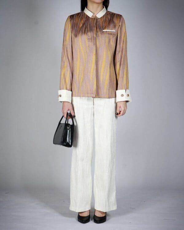 مدل کت زنانه؛ مانتو کتی ژاکارد از محصولات فروشگاه زی زی مد